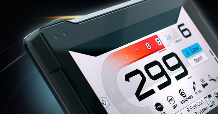 Close-up of an AUMOVIO TFT display for motorcycles. Aumovio offers a range of high-performance instrument displays tailored for motorcycles, designed to offer maximum flexibility. It employs automotive-grade technology with optical bonding for crystal-clear visuals. 