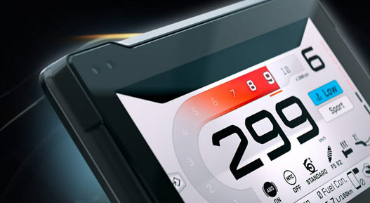 Close-up of an AUMOVIO TFT display for motorcycles. Aumovio offers a range of high-performance instrument displays tailored for motorcycles, designed to offer maximum flexibility. It employs automotive-grade technology with optical bonding for crystal-clear visuals. 