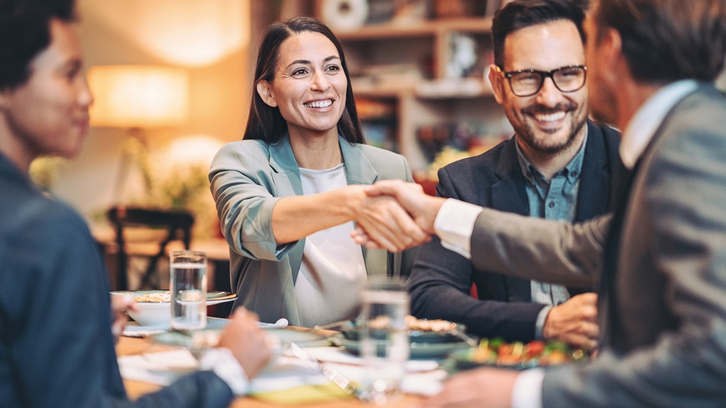 Multiracial group of business persons in a restaurant
