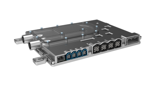 Close-up view of an automotive high-performance computer (HPC) unit in a metallic housing. The component features multiple connectors on one side, including blue and black multi-pin sockets, and two cylindrical ports for high-speed data or power connections. The top surface has a patterned area with several screws securing the cover.