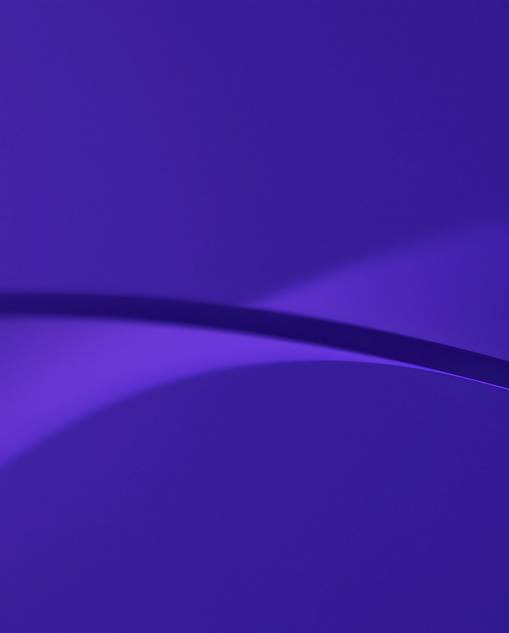 A sleek abstract background in deep purple tones with smooth curves and gradients, creating a modern and dynamic visual design.