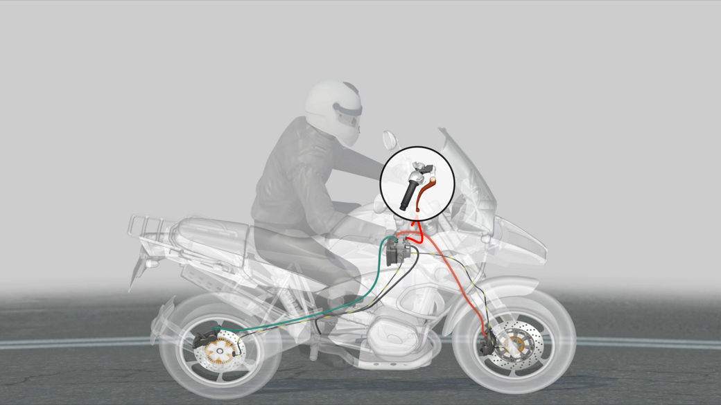 The image shows the ABS system inside a transparent motorcycle. 
