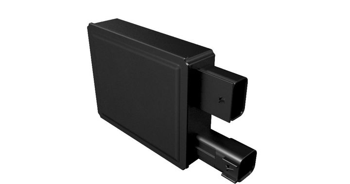 Automotive radar sensor with black cover and silver mounting frame for advanced driver assistance applications.