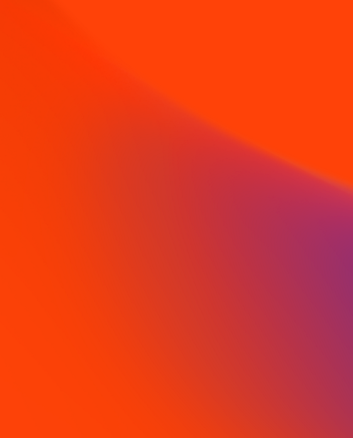A vibrant abstract background featuring a smooth gradient blend of orange, red, and purple tones, creating a dynamic and modern visual effect.