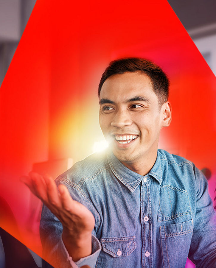 Group of individuals engaged in conversation in a modern indoor environment, highlighted by vivid red and purple graphic overlays.