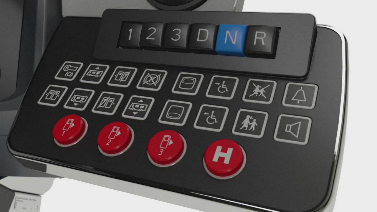 Video of Driver's Workplace+. It combines all the advantages and features of the proven Driver's Workplace Classic with a fresh design and modern functionality. It features a multifunctional instrument cluster with a 12.3-inch TFT color display, offering customizable scaling options. For seamless integration with the bus interior, interchangeable pads are available. Additionally, the workplace includes an accessory holder and a universal socket, optionally suitable for devices such as mobile phones.