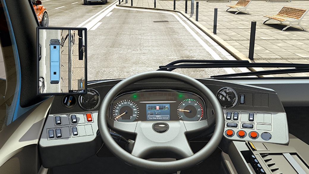 Ansicht aus dem Cockpit eines Busfahrers mit digitalen Spiegeln und Armaturenbrettanzeige für verbesserte Sicht und Sicherheit.