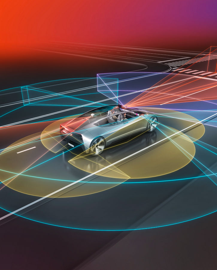 Image of a concept vehicle from AUMOVIO, in whose surroundings several blue, green, purple, and red areas are scanned via various cameras.