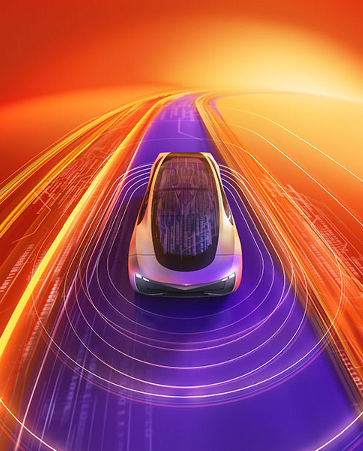 A futuristic car driving on a glowing digital road with vibrant orange, yellow, and purple light trails, representing advanced technology and the future of autonomous mobility.