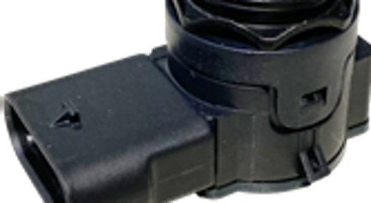 Compact black ultrasonic parking sensor with integrated connector for automotive applications.