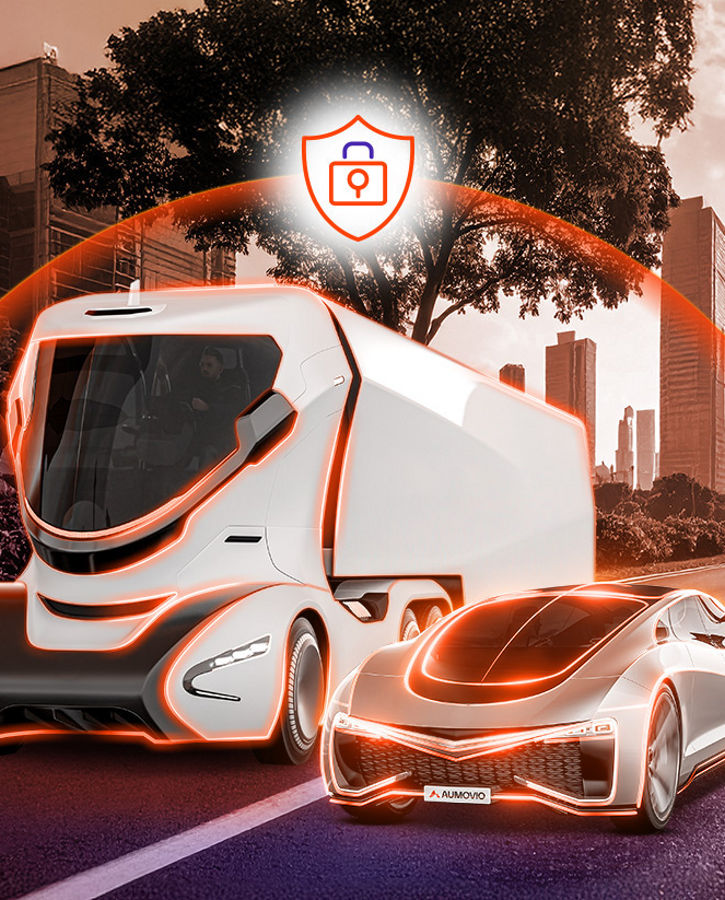 A futuristic truck and car with orange highlights on a tree-lined road are protected by an orange cybersecurity dome, with city skyscrapers visible in the background.