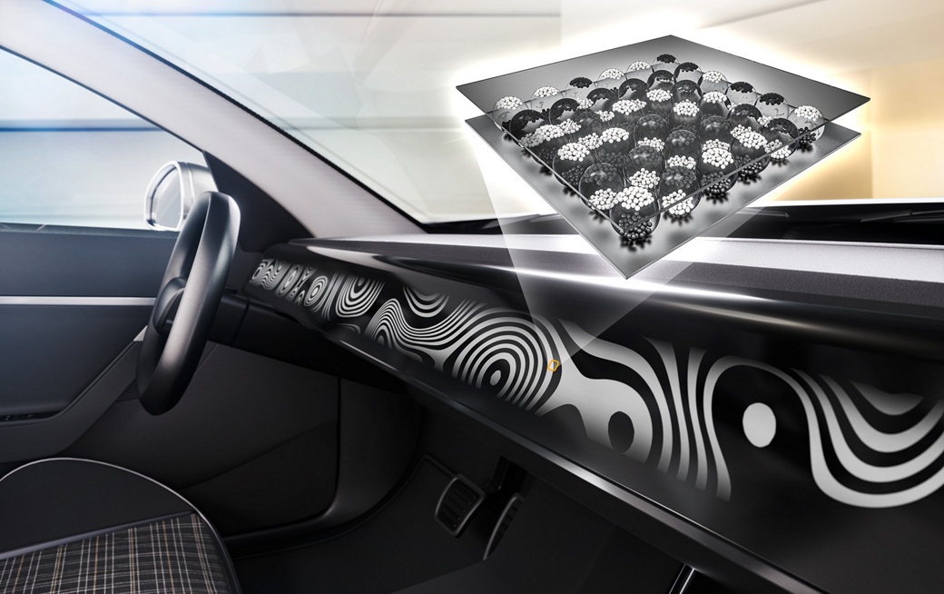 Image of a innovative vehicle dashboard that enables a limitless range of design variations through e-ink/e-paper technology. AUMOVIO's ePaper-based decorative displays transform interior elements into customizable digital canvases with energy efficiency, ultra-thin form factor, and sunlight readability. 