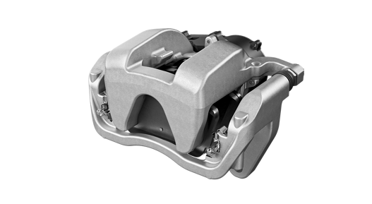Close-up of a silver automotive brake caliper with a robust design, showing detailed mechanical components and mounting points.