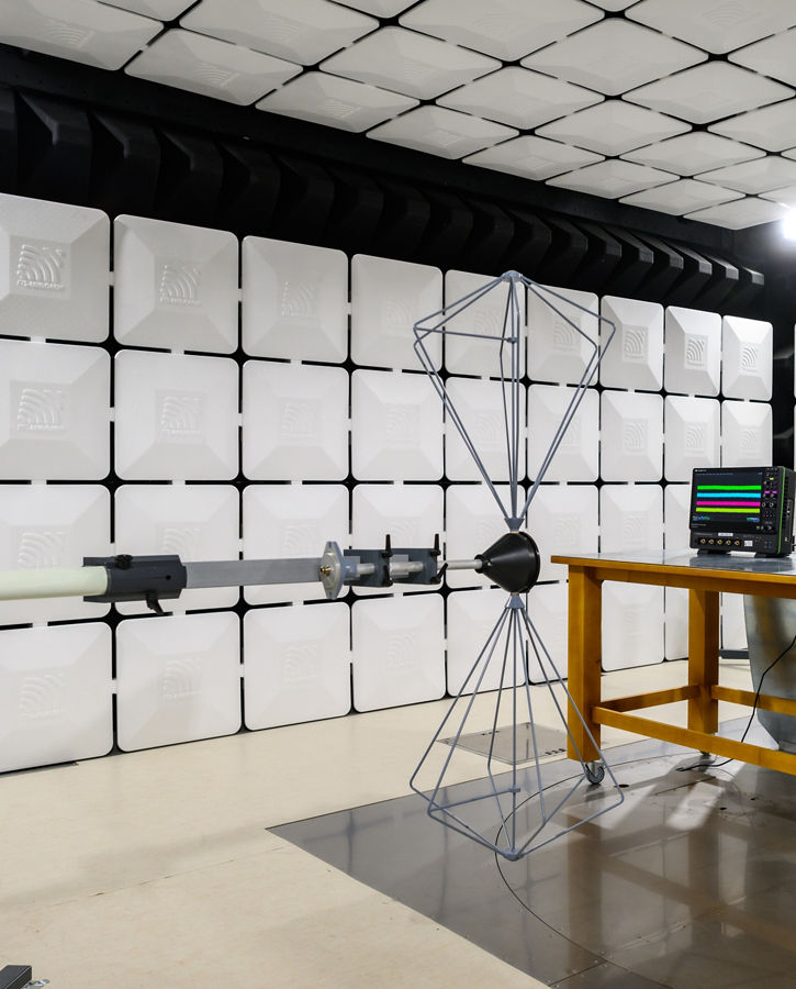 Image of an EMC testing laboratory. EMC testing services ensure that electronic systems operate reliably in environments with electromagnetic interference, while meeting global regulatory and OEM-specific standards. Our accredited laboratories offer comprehensive testing capabilities, including emissions, immunity, transient, and ESD evaluations, using advanced chamber technologies and near-field scanning.