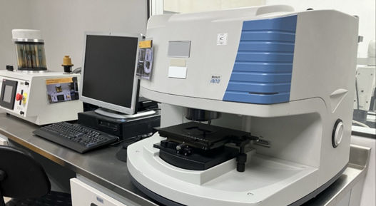Image of a machine for failure analysis. Failure analysis is a structured approach to identify the root causes of failures in products, processes, or systems during design, manufacturing and validation phases.