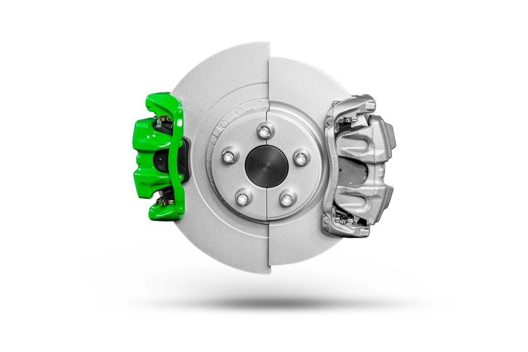 Close-up view of a green electric brake caliper featuring integrated electronic and hydraulic components. The vibrant color highlights its application in performance or concept vehicles.