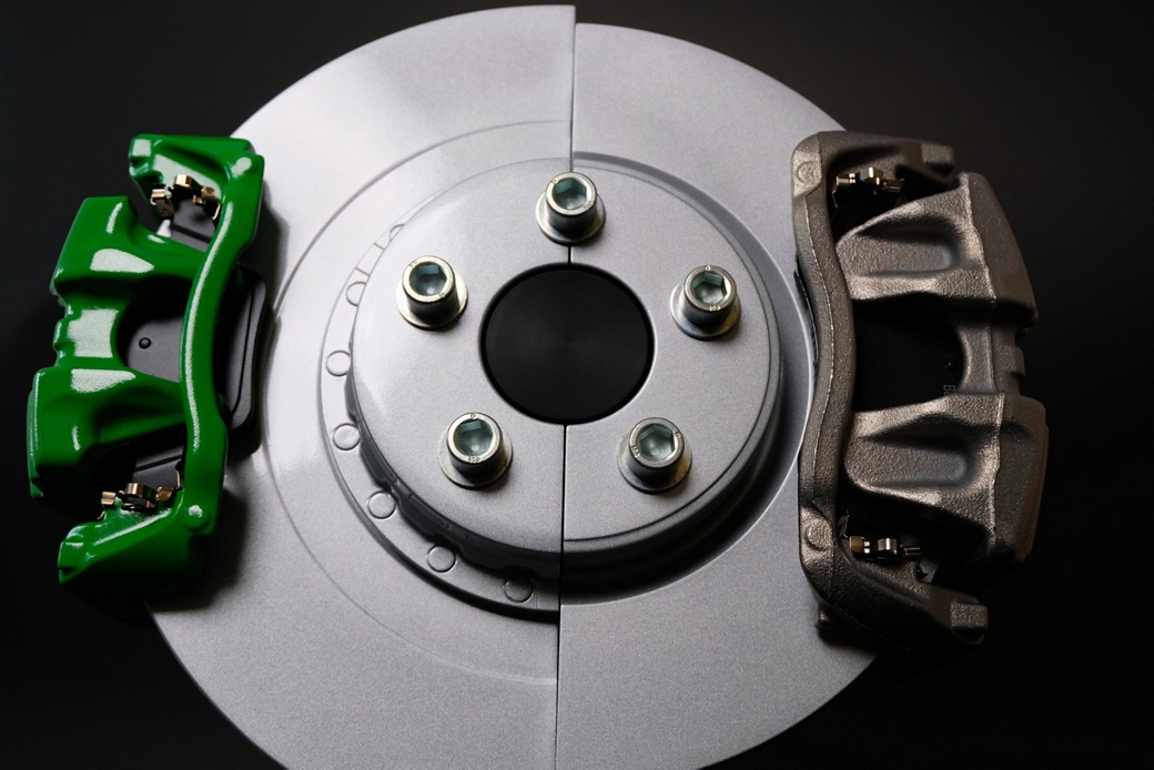 green electric caliper compared to electric caliper, closeup
