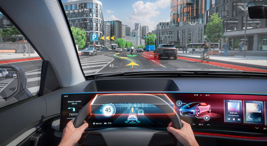 Image of a futuristic vehicle interior with a view through the windshield. Navigation, traffic, and warning information are projected directly onto the windshield via a head-up display, precisely where the driver needs it.