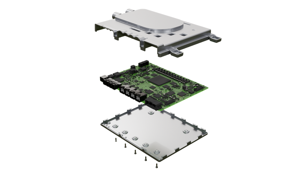 Exploded view of an automotive high-performance computer (HPC). The image shows three layers: a metallic top cover, a green printed circuit board with microchips and connectors, and a metallic bottom plate with screws arranged below.