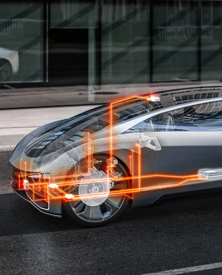 Side view of a futuristic silver car with transparent body overlay showing internal components and orange glowing circuit lines. The highlighted elements represent integrated high-performance computing architecture for advanced vehicle functions.