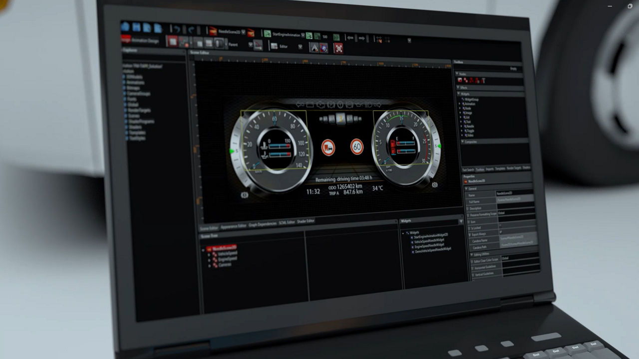 Laptop screen displaying automotive software interface for instrument cluster configuration. The program shows a digital dashboard with speedometer, tachometer, and warning indicators, along with multiple toolbars and parameter settings for vehicle electronics development.