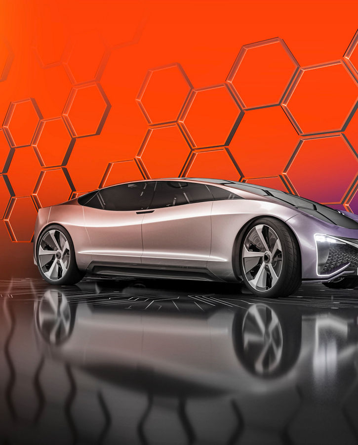 Futuristic silver concept car displayed against a vibrant orange and purple background with hexagonal patterns.