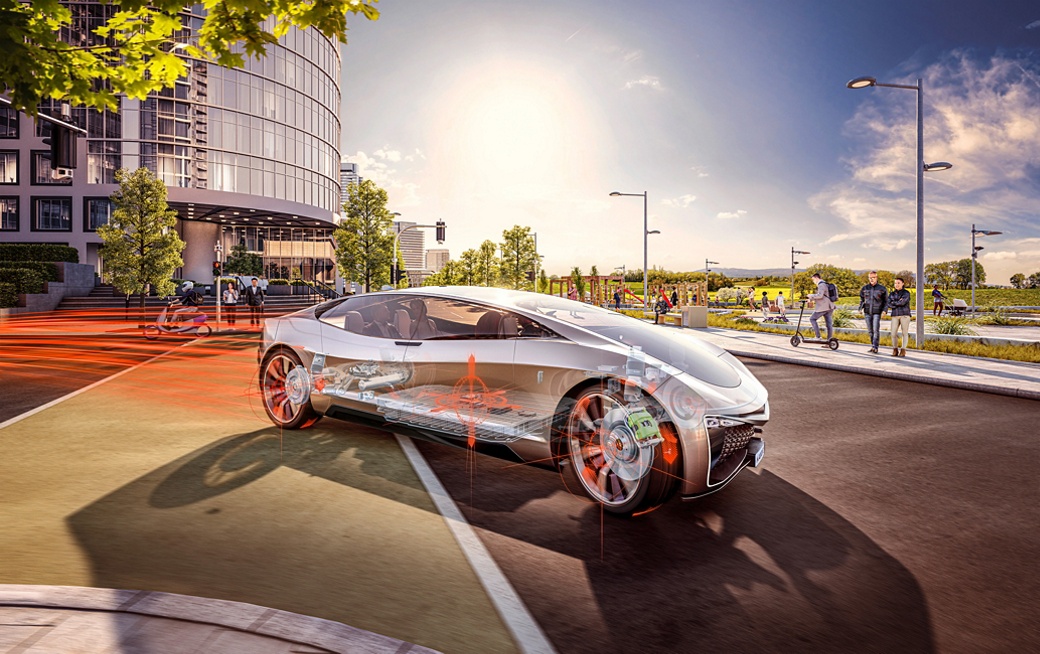Bild des halbtransparenten AUMOVIO-Konzeptfahrzeugs an einer Kreuzung in der Stadt mit orange hervorgehobenen Sicherheitselementen im Fahrzeug. Der Geschäftsbereich Safety and Motion verfügt über mehr als 100 Jahre Erfahrung im Bereich Fahrzeugsicherheit.