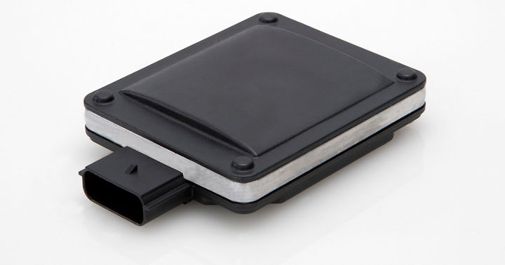 Compact radar sensor with black casing and single connector, designed for short-range detection.