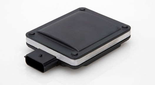 Compact radar sensor with black casing and single connector, designed for short-range detection.