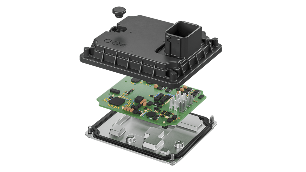 Close-up photo showing the circuit boards of a twin motor control unit. This electronic control unit automates gear shifts, supporting or replacing clutch and shift actions with two specialized electric motors. 
